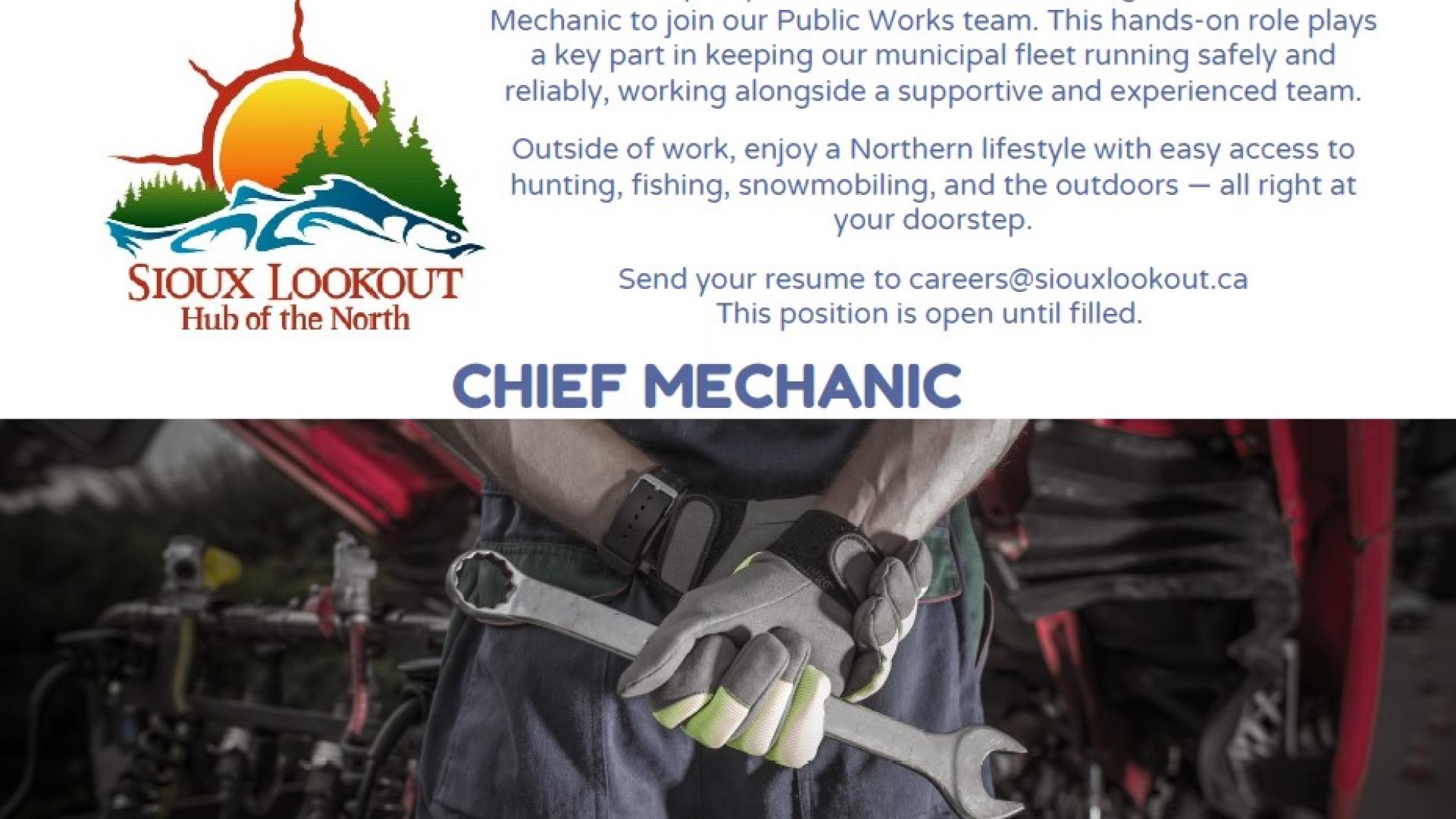 Hands holding wrench