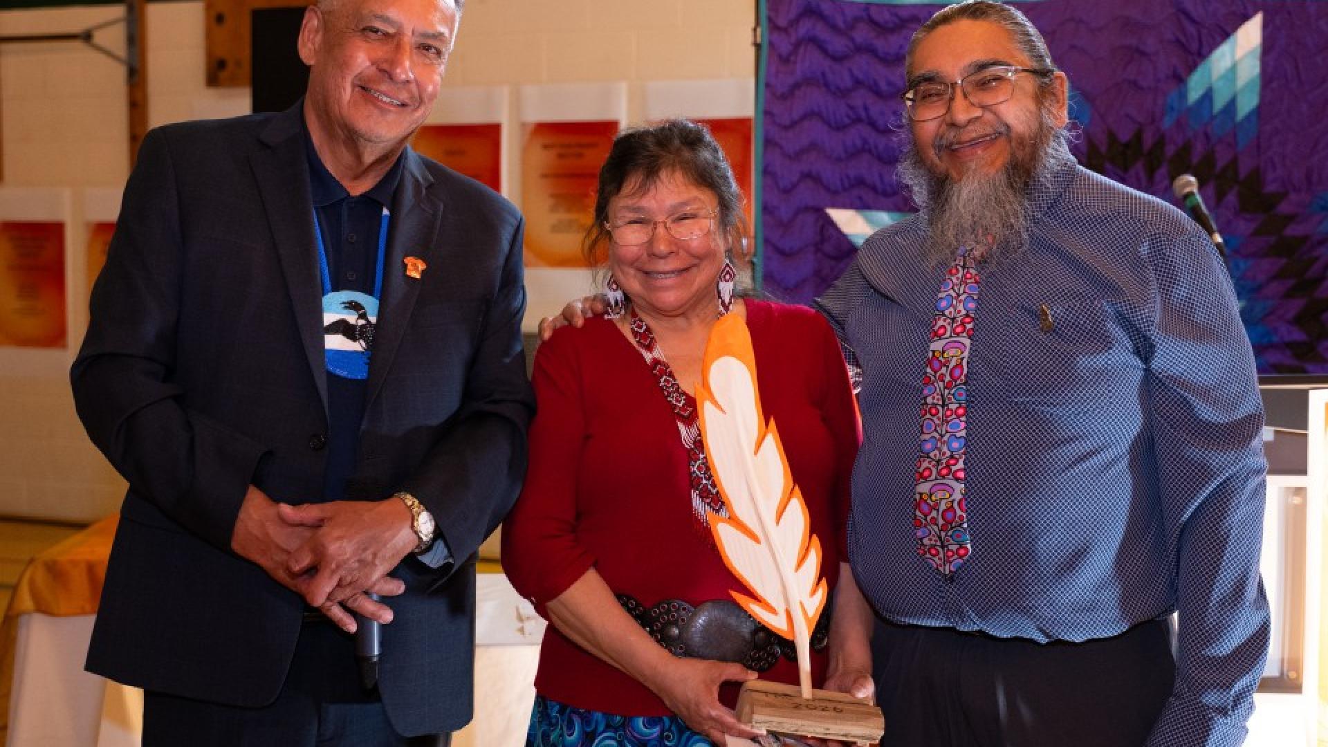 Romaine and Victor Lyon receiving award