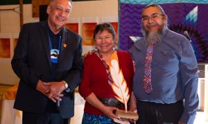 Romaine and Victor Lyon receiving award