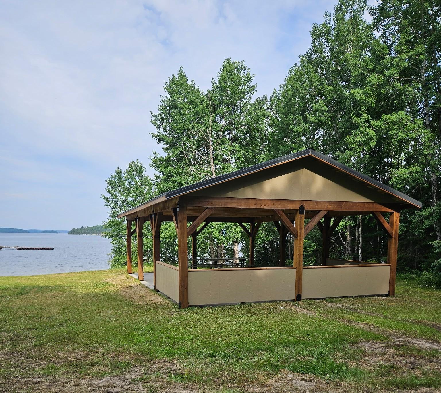 Boat Bay Park pavilion with scenic waterfront views in the background.